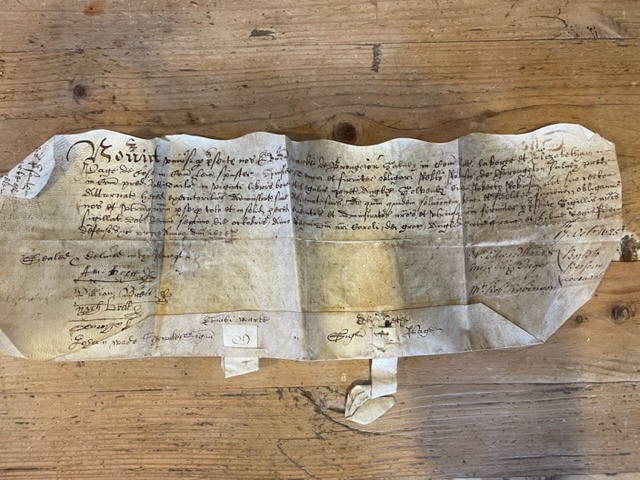 Note the way in which the document was cut to share so both parts had to align as proof of ownership